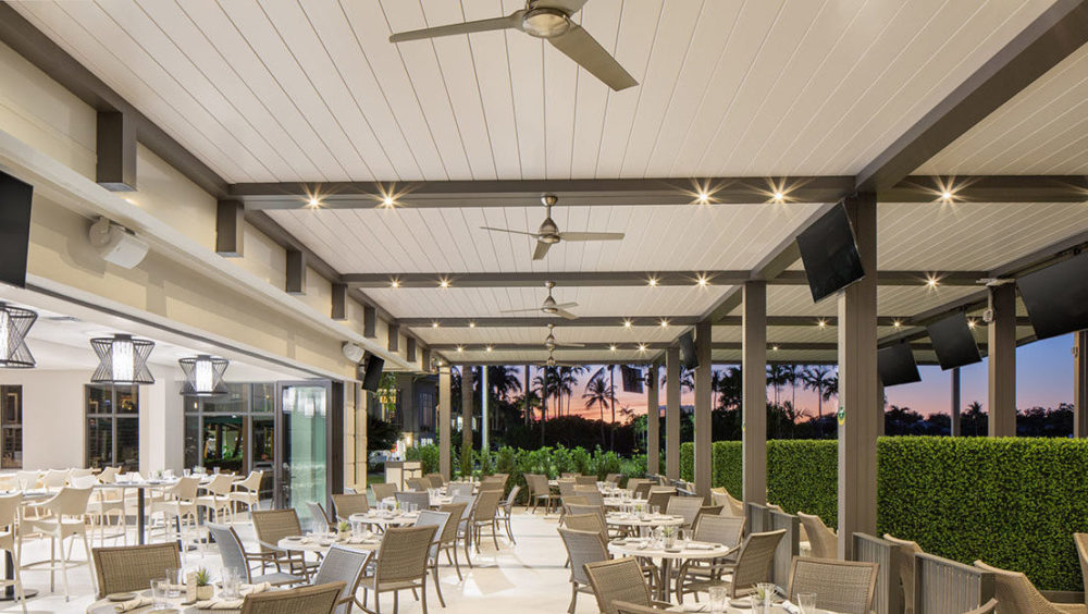 Outdoour dining room at Boca West Country Club, FL - Louvered pergola system