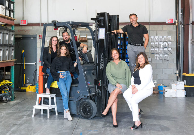 Pergola Contractors Team on a forklift in the warehouse