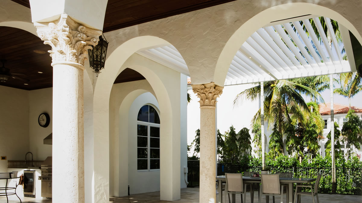Patio transformation with a louvered pergola in Palm Beach