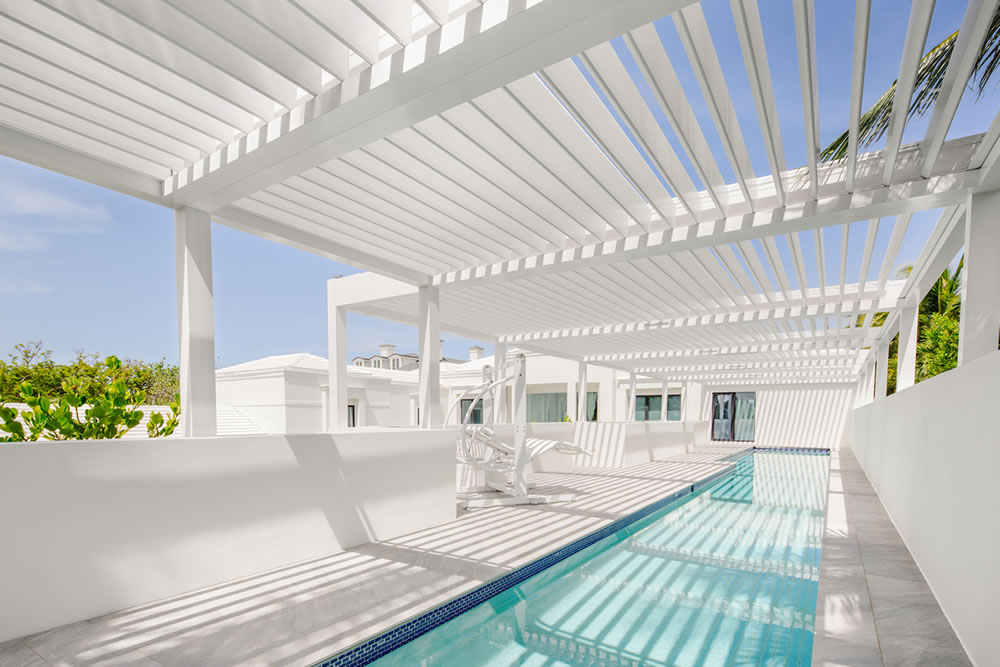Covered pool deck pergola - White by Azenco, installed by Syzygy Global Delray Beach, FL