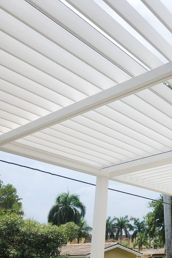 white aluminum louvered roof