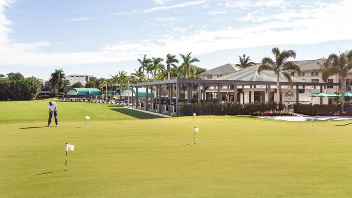 Boca West country club, view of the Golf court and golf bay pergola at the back.